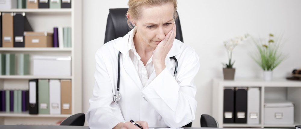 physician-at-desk-1000x430