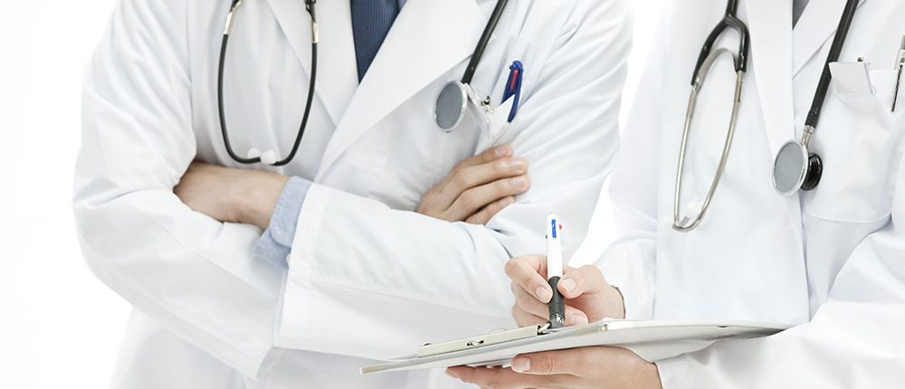 physicians-reviewing-chart-1000x430